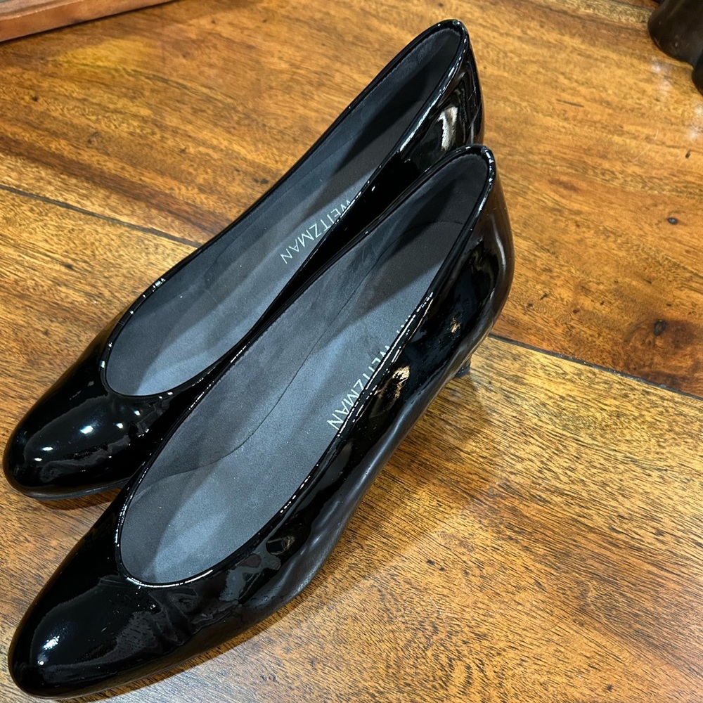 Stuart Weitzman size 7M black patent leather, low heels.